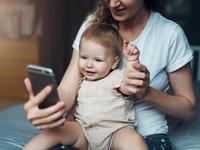 Mom and baby with phone